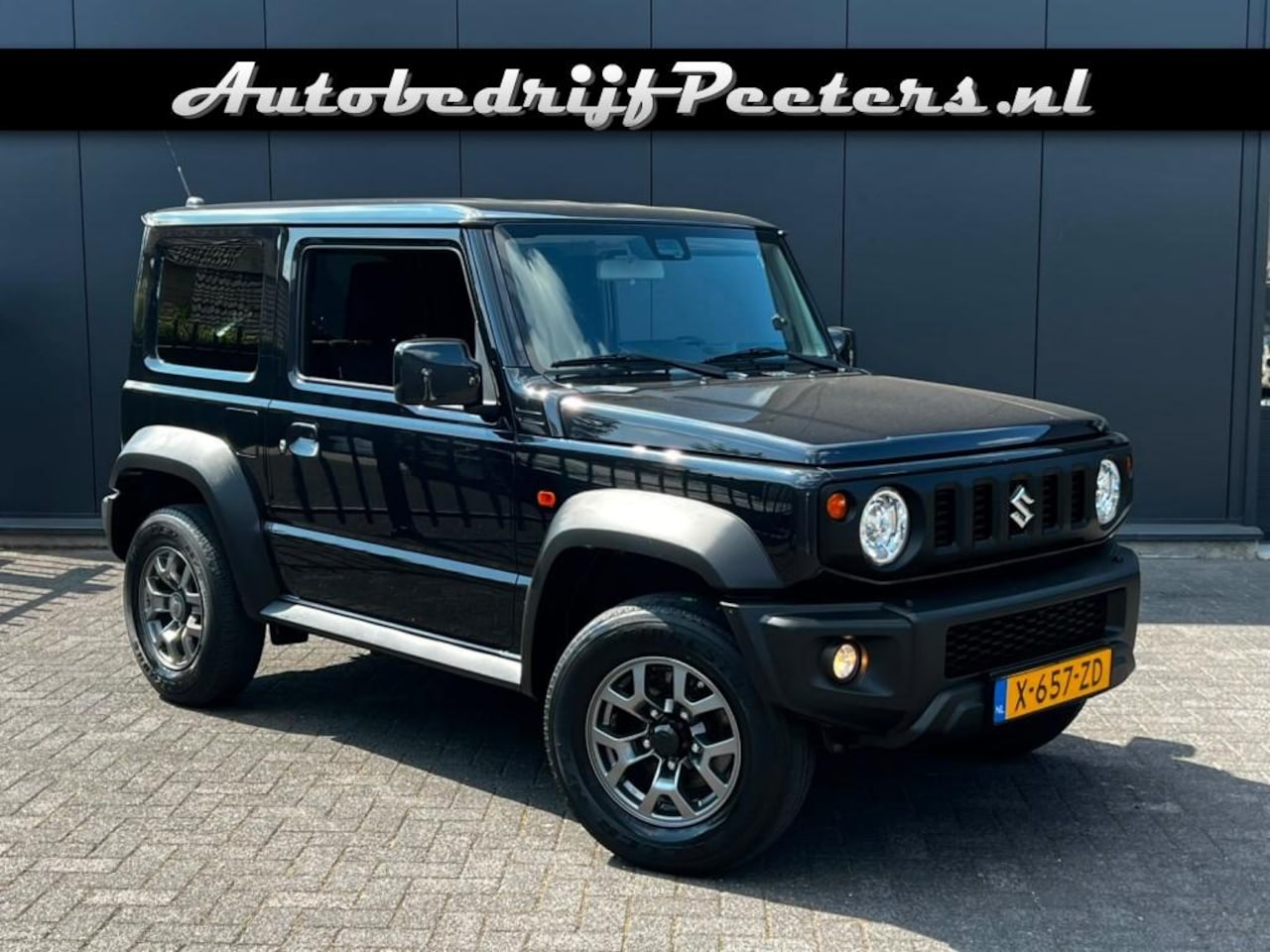 Suzuki Jimny - 1.5 AllGrip 4-zits Navi Cruise ECC - AutoWereld.nl