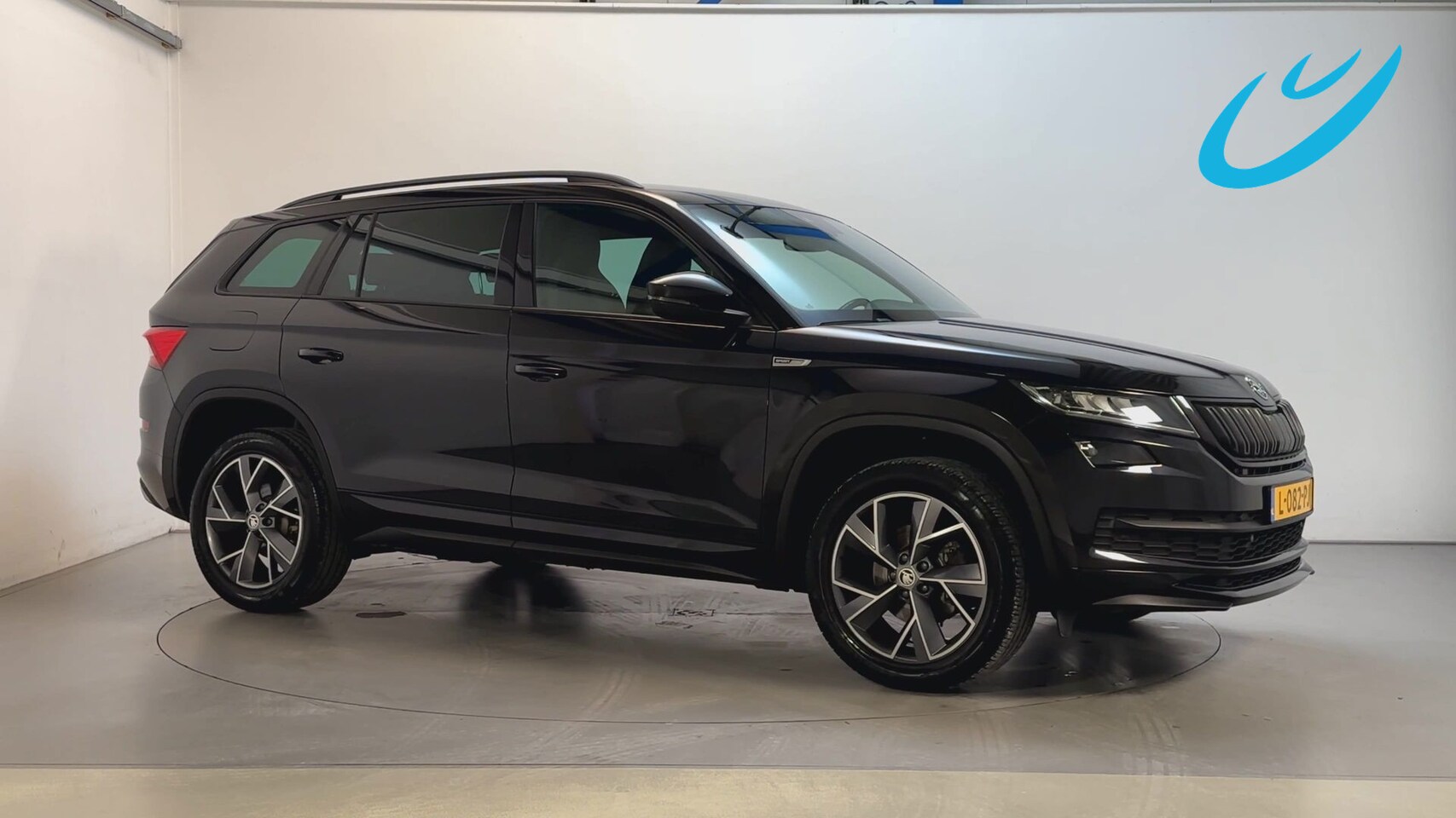 Skoda Kodiaq - 1.5 TSI 150pk DSG Sportline Business Alcantara Stoelverwarming Trekhaak Camera Stoelverwar - AutoWereld.nl