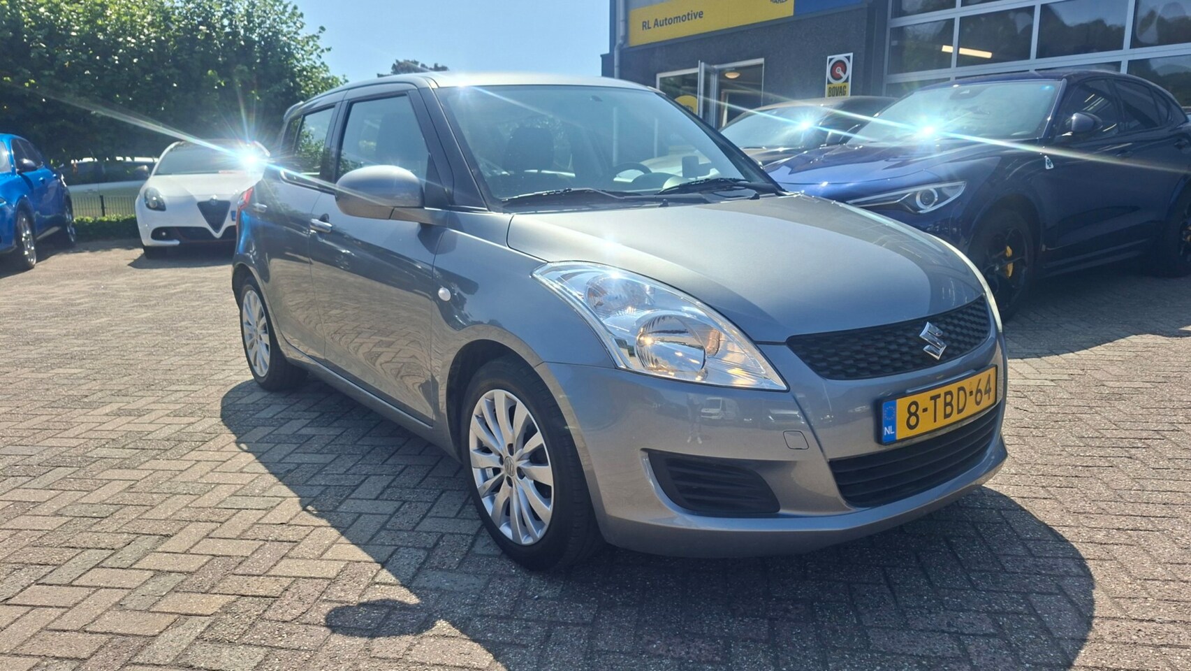 Suzuki Swift - 1.2 Bandit EASSS - Airco - 5 Deurs - Navigatie - AutoWereld.nl