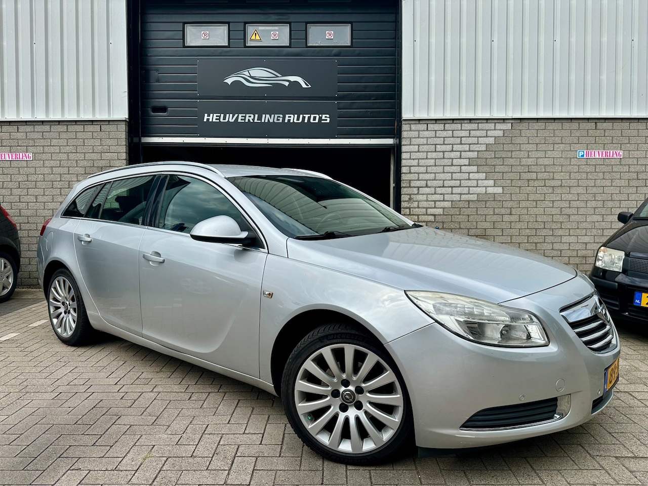 Opel Insignia Sports Tourer - 1.8 Edition | Cruise | Clima | Trekhaak | APK - AutoWereld.nl
