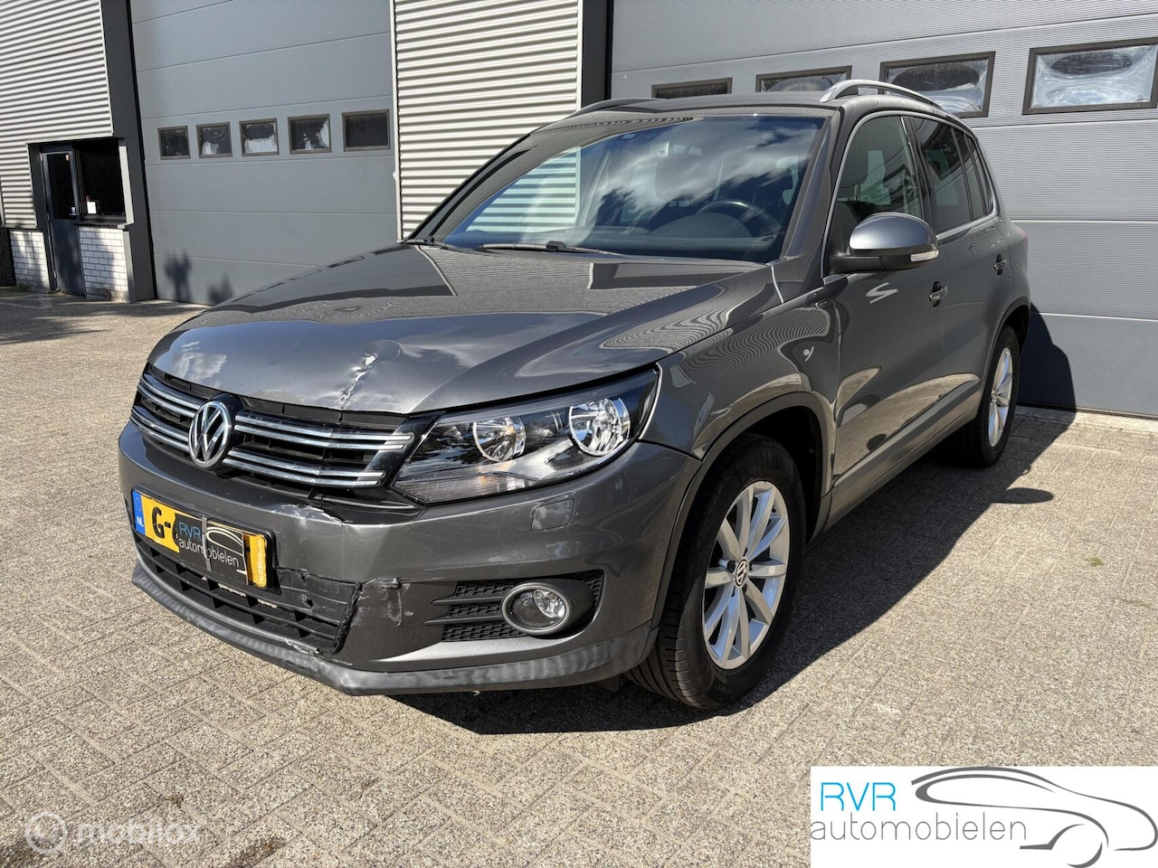 Volkswagen Tiguan - 1.4 TSI Sport&Style AUTOMAAT/CRUISE/NAVI - AutoWereld.nl