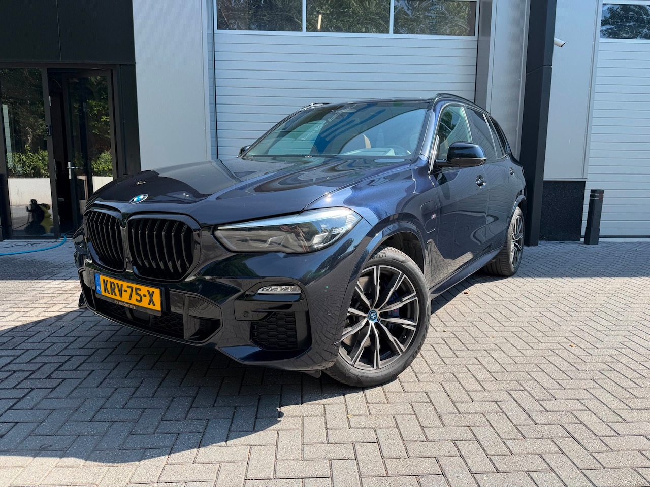 BMW X5 - XDrive45e High Executive / Pano / Trekhaak / Stoelkoeling - AutoWereld.nl