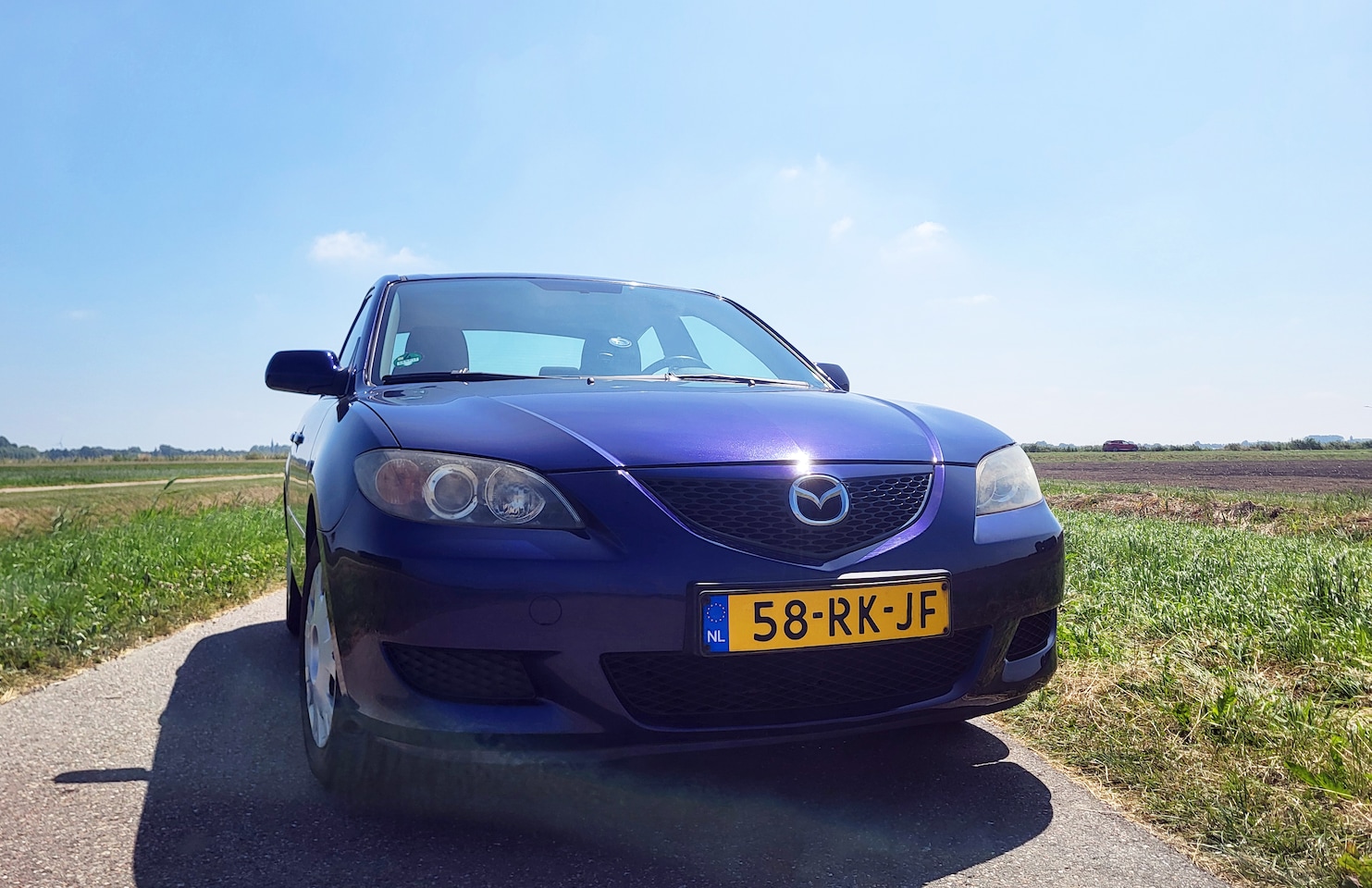 Mazda 3 - 1.6 Touring Blauw - AutoWereld.nl