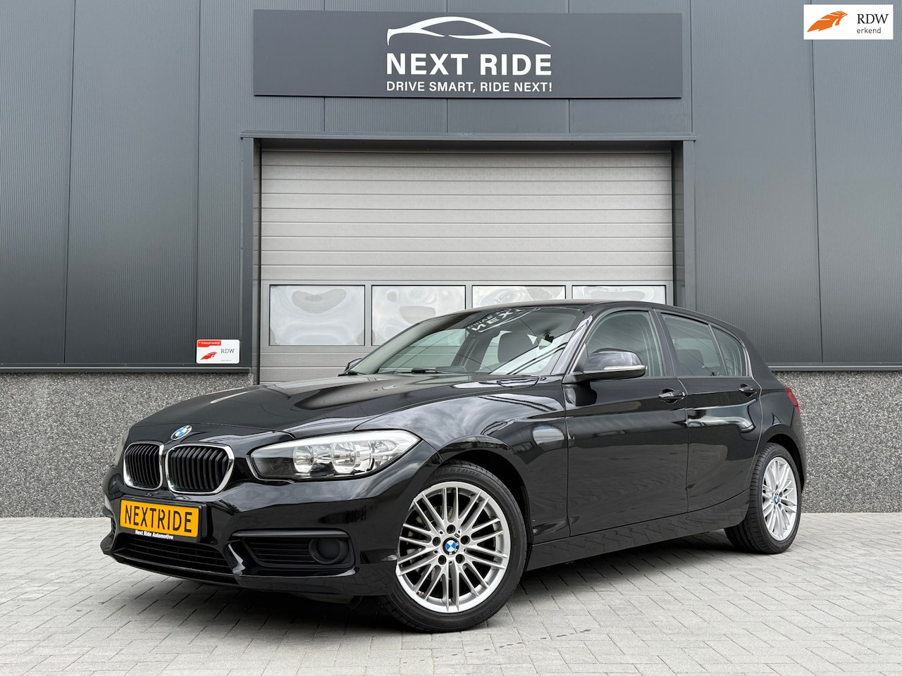 BMW 1-serie - 118I | Climate Control | Bluetooth | PDC | Stoelverwarming | LED | 17'' LM | APK 03/27 | V - AutoWereld.nl