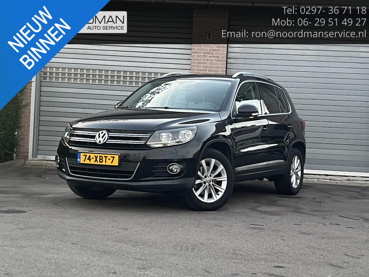 Volkswagen Tiguan - 1.4 TSI Sport&Style - AutoWereld.nl