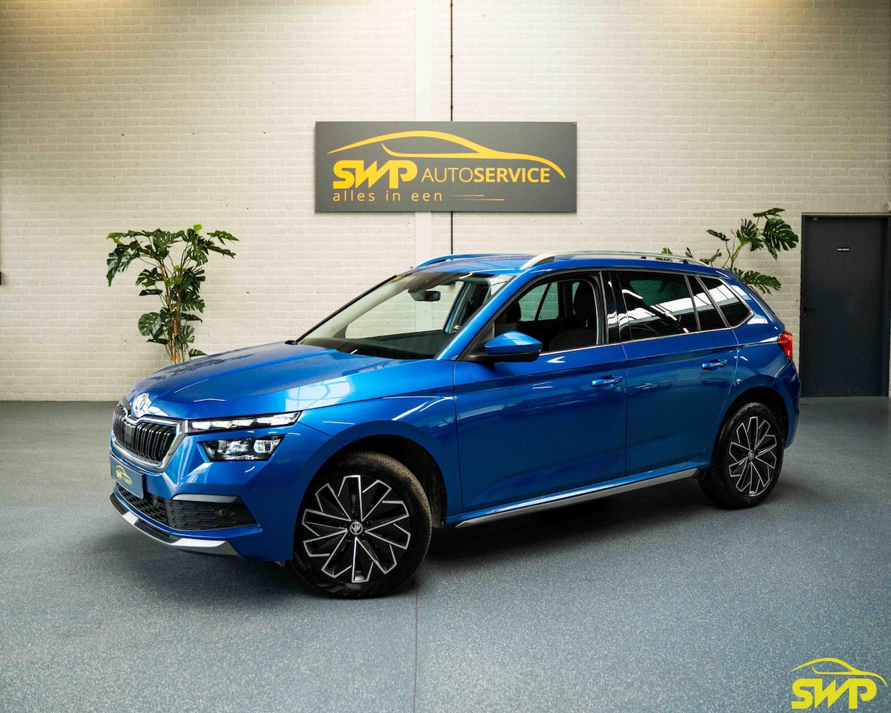 Skoda Kamiq - 1.5 TSI ACT Business Edition | Metallic | Navi | Cam | Automaat - AutoWereld.nl