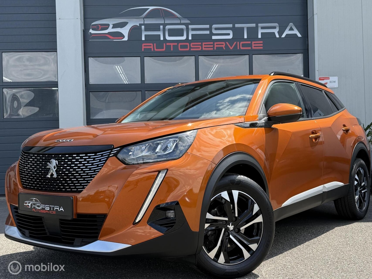 Peugeot 2008 - 1.2 PureTech Allure Pack Camera CarPlay 17inch - AutoWereld.nl
