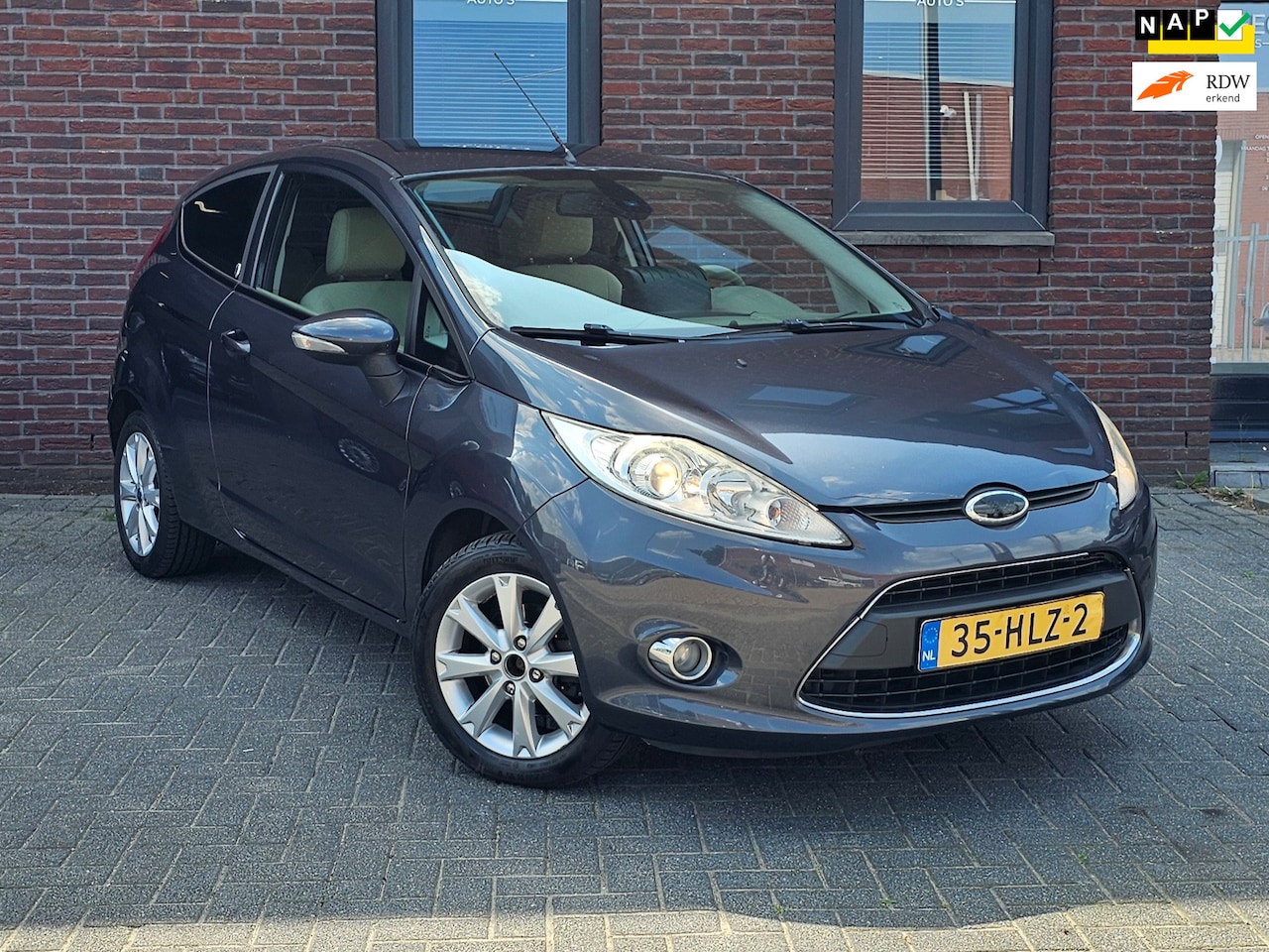 Ford Fiesta - 1.4 Ghia 1.4 Ghia - AutoWereld.nl