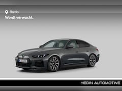 BMW i4 - eDrive40 84 kWh | Ambiance verlichting | Comfort Access | HIFI | M Sportpakket Pro | Parki