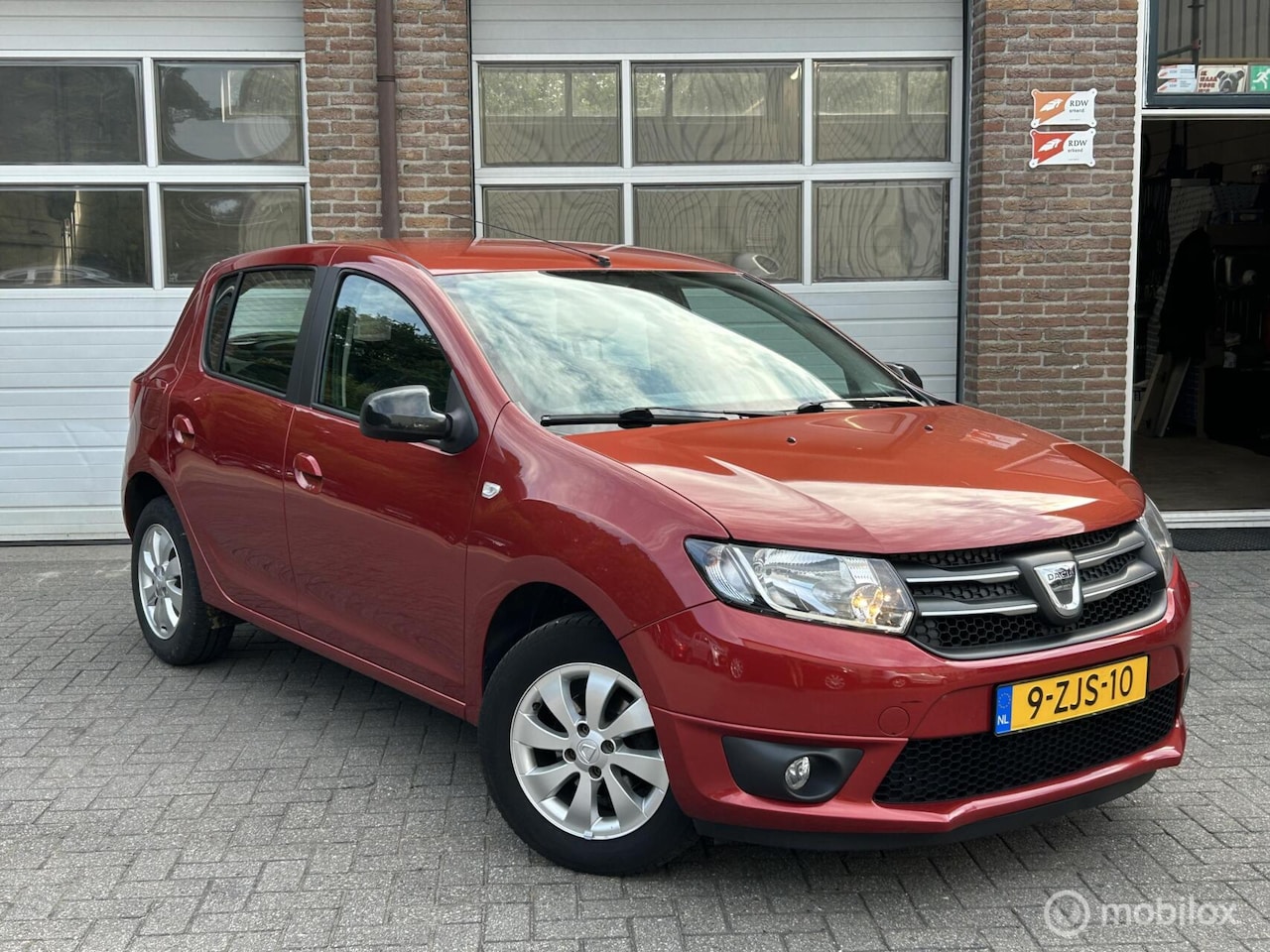 Dacia Sandero - 0.9 TCe Blackline | Airco | Cruise | Trekhaak - AutoWereld.nl
