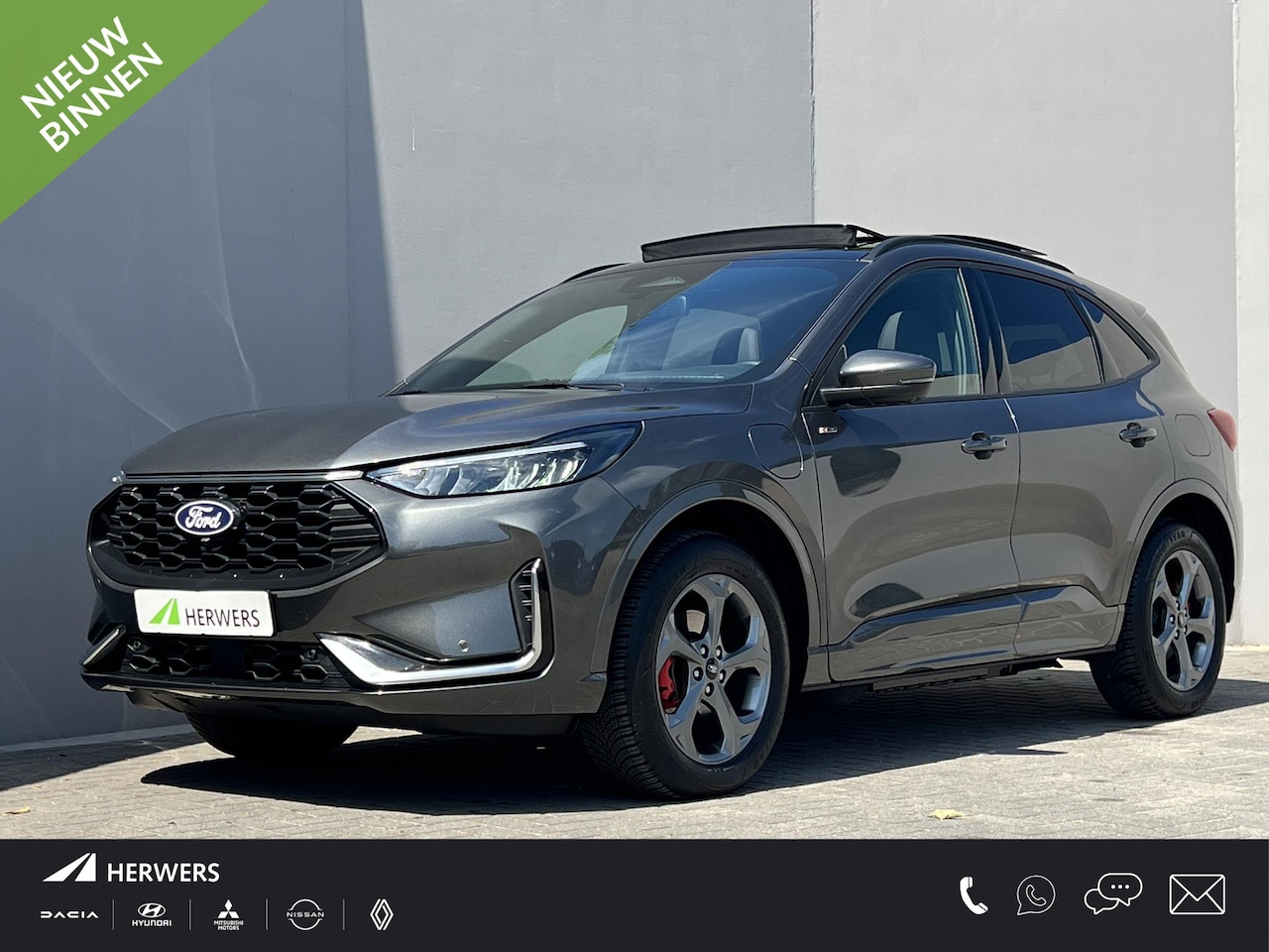Ford Kuga - 2.5 PHEV ST-Line X / 2.100 kg trekhaak elektrisch uitklapbaar / Elektrische stoelen & kle - AutoWereld.nl