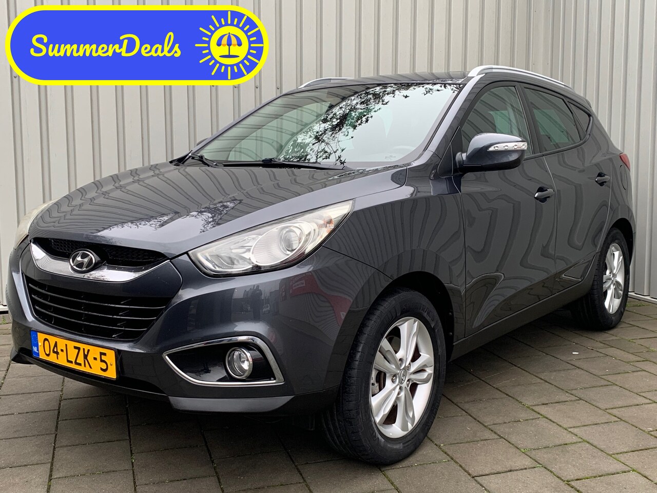Hyundai ix35 - 2.0i Business Edition|Navigatie|149000KM|Climate Control| - AutoWereld.nl