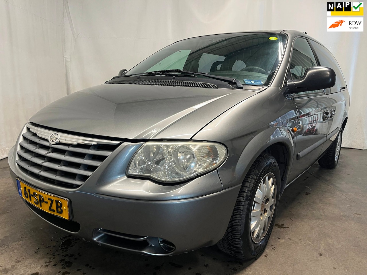 Chrysler Grand Voyager - 3.3i V6 SE Luxe SCHADEAUTO! - AutoWereld.nl