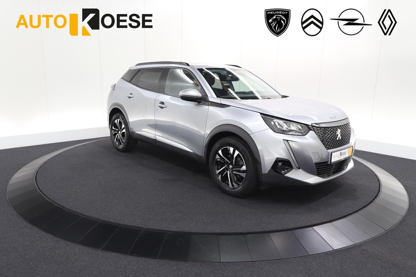 Peugeot 2008 - PureTech 130 PK Allure Pack | Trekhaak | Camera | Adaptieve Cruise control | Keyless Entry - AutoWereld.nl