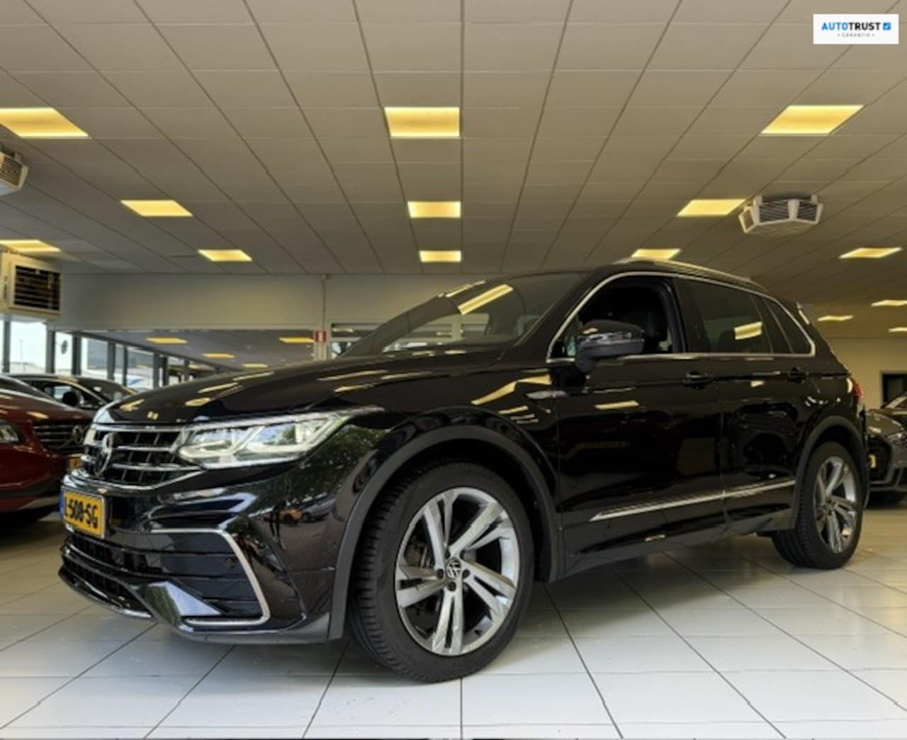 Volkswagen Tiguan - 1.5 TSI R-Line Business+/ 3x R-Line/Pano/Leder/VOL opties/Camera/Apple Carplay/Memory stoe - AutoWereld.nl
