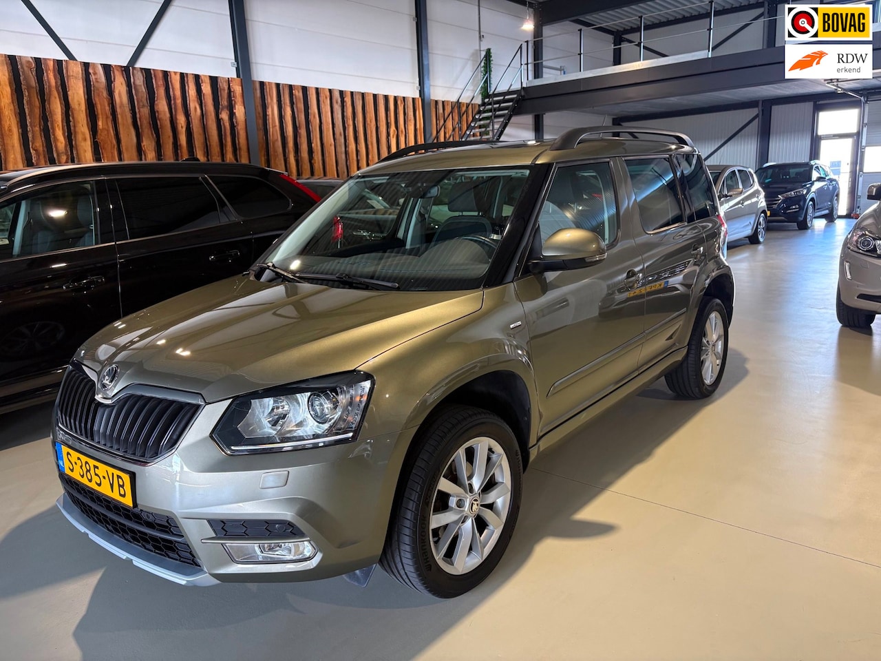 Skoda Yeti - 1.2 TSI Greentech Ambition Joy panoramadak trekhaak navi - AutoWereld.nl