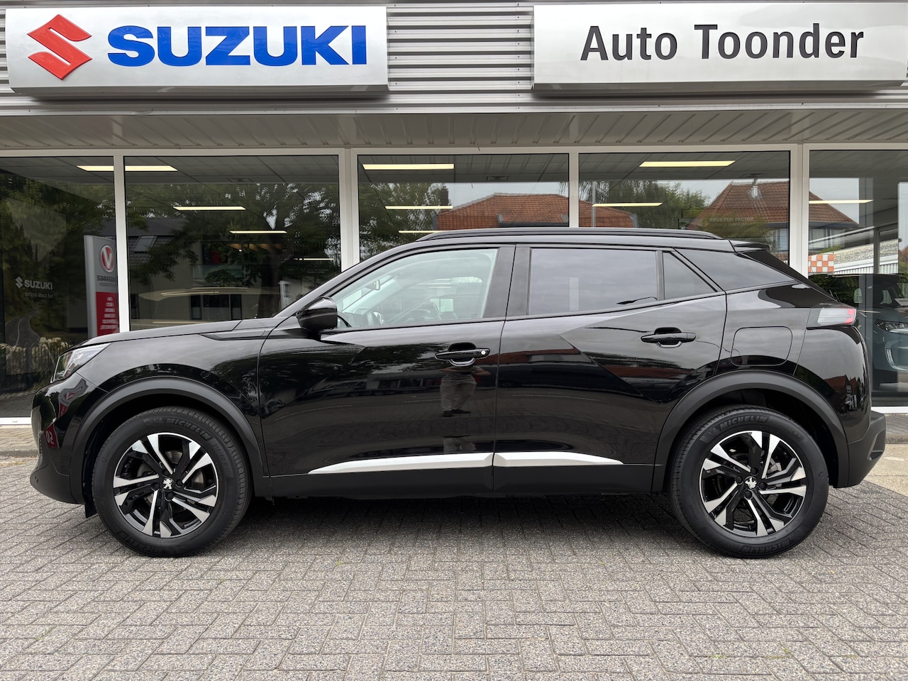 Peugeot 2008 - 1.2 PureTech Allure | Keyless entry/start | Adaptive Cruise Control | Apple carplay/androi - AutoWereld.nl