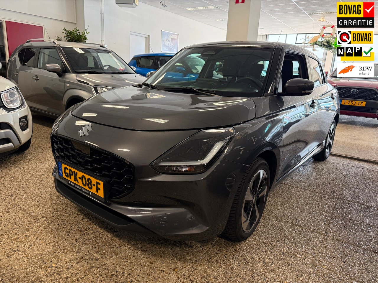 Suzuki Swift - 1.2 Style Smart Hybrid | Carplay| 10 jaar garantie | All season banden - AutoWereld.nl