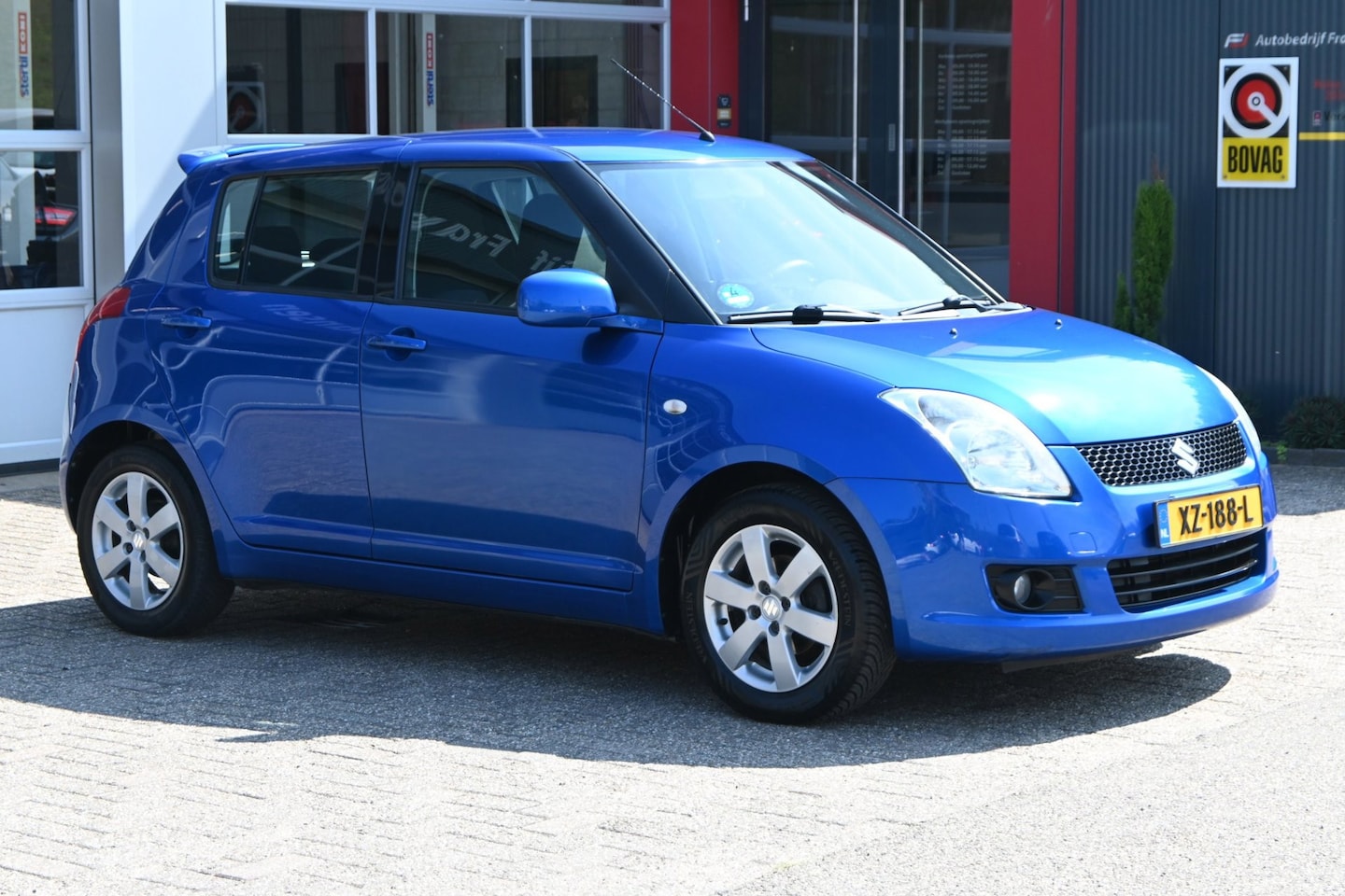 Suzuki Swift - 1.3 92pk | Keyless | Climate Control | LM-Velgen - AutoWereld.nl