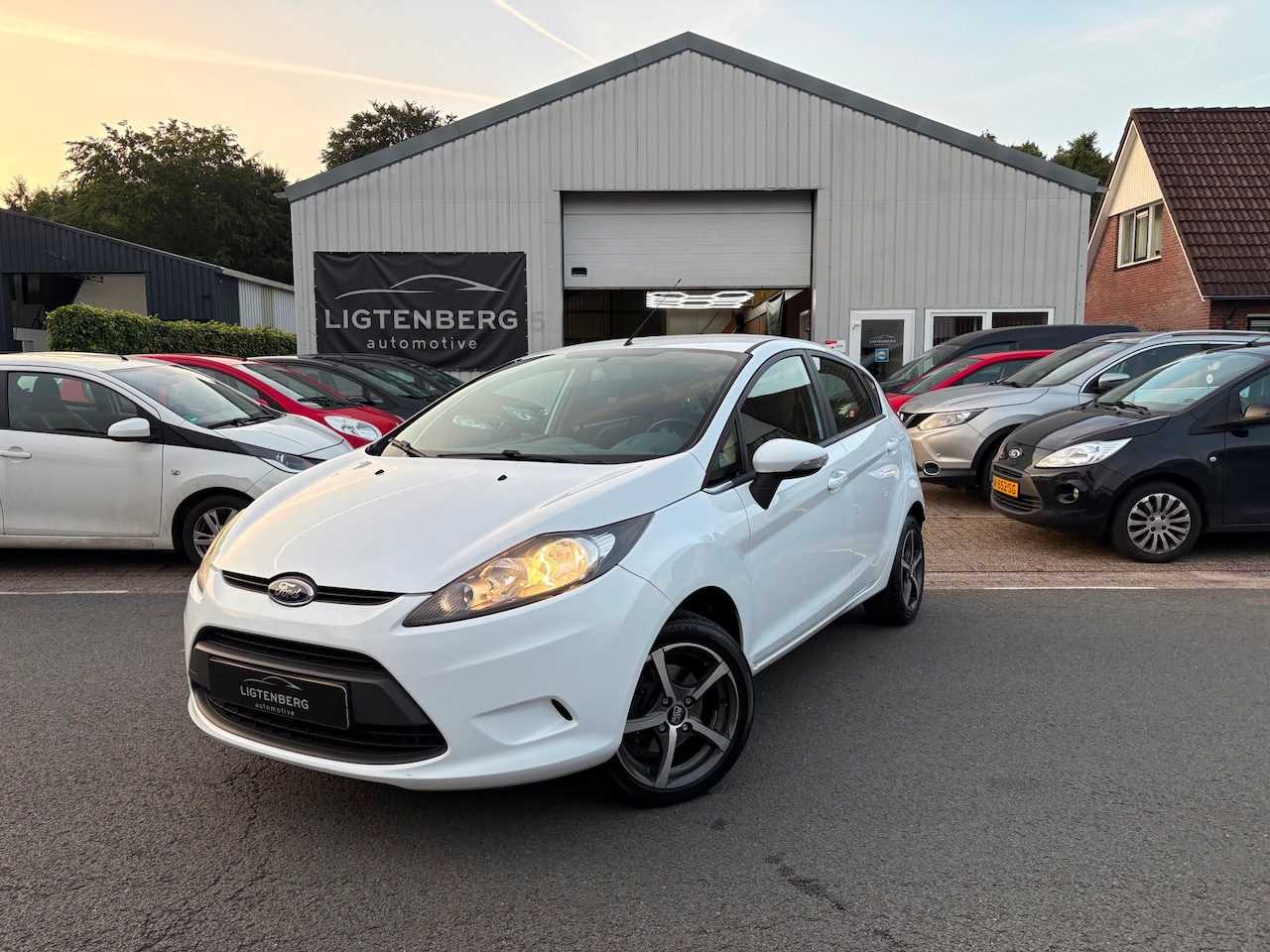 Ford Fiesta - 1.25 Limited PARKEERSENSOREN/AUX/SPORTVELGEN - AutoWereld.nl