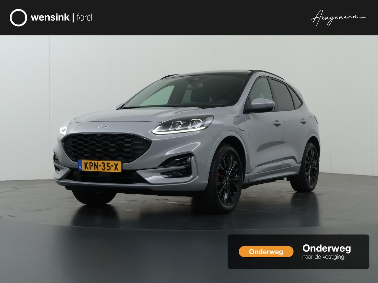 Ford Kuga - 2.5 PHEV ST-Line X | Elekt. inklapbare Trekhaak | Panoramadak | Winterpakket | Head Up | M - AutoWereld.nl