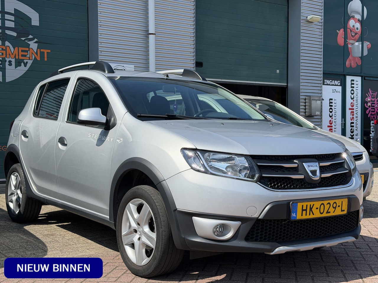 Dacia Sandero Stepway - 0.9 TCe Lauréate / Cruise / Airco / Navi / PDC / 1e eigenaar - AutoWereld.nl