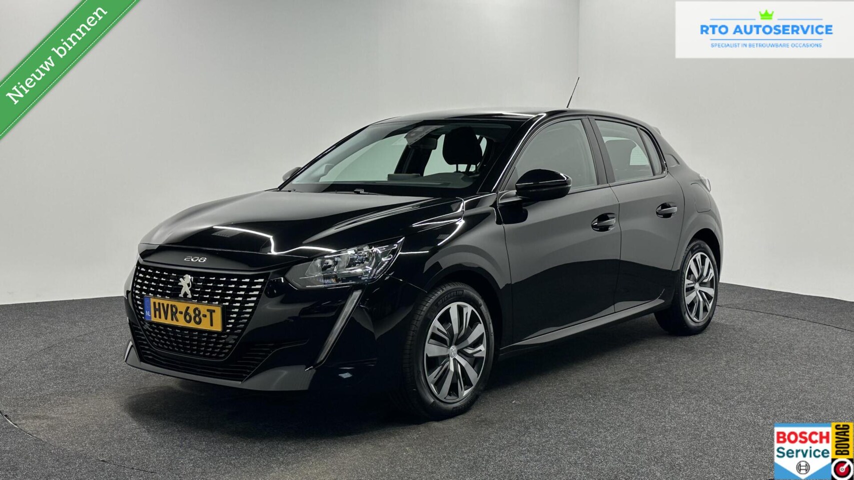 Peugeot 208 - 1.2 PureTech Blue Lease Allure NAVI CARPLAY CRUISE. - AutoWereld.nl