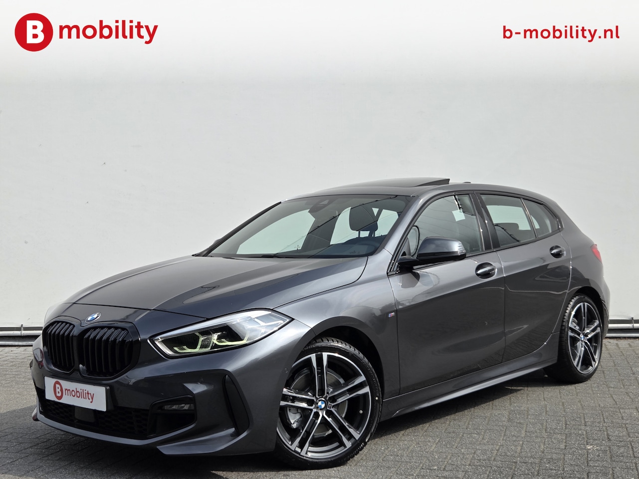 BMW 1-serie - 118i High Executive M-sport 140pk! Automaat | Panorama dak | Achteruitrijcamera | Apple Ca - AutoWereld.nl