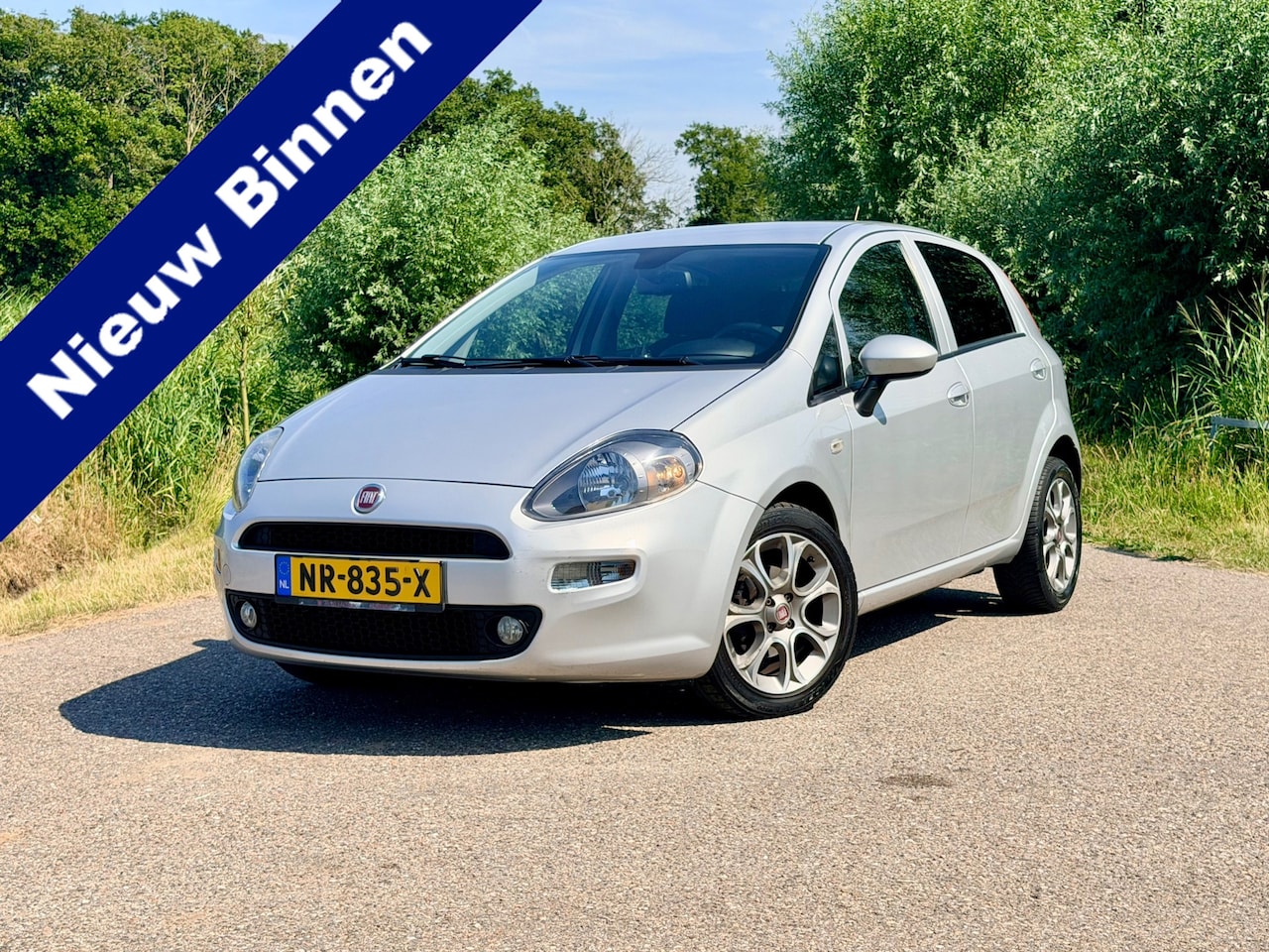Fiat Punto Evo - 0.9 TwinAir Lounge Clima PDC Cruise Control 16INCH NAP 6BAK - AutoWereld.nl