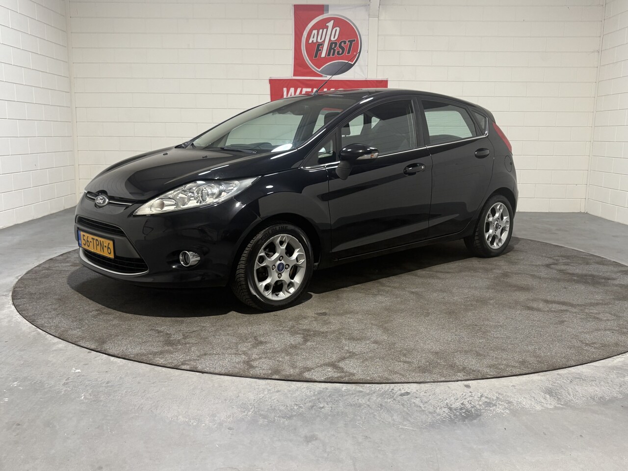 Ford Fiesta - 1.25 Titanium 1.25 Titanium, Clima, Cruise, Parkeersensoren, 15 inch lichtmetaal, Isofix, Prijs inclusie - AutoWereld.nl