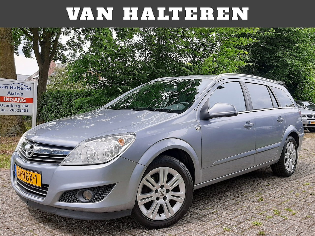 Opel Astra Wagon - 1.6 Cosmo Airco Navi Leder Cruise Control - AutoWereld.nl