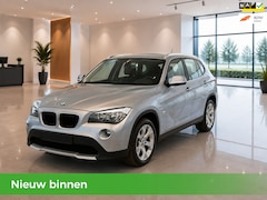BMW X1 - SDrive18i NAP- Airco- Navi - Trekhaak- Parkeersensoren- Elek.ramen- Velgen