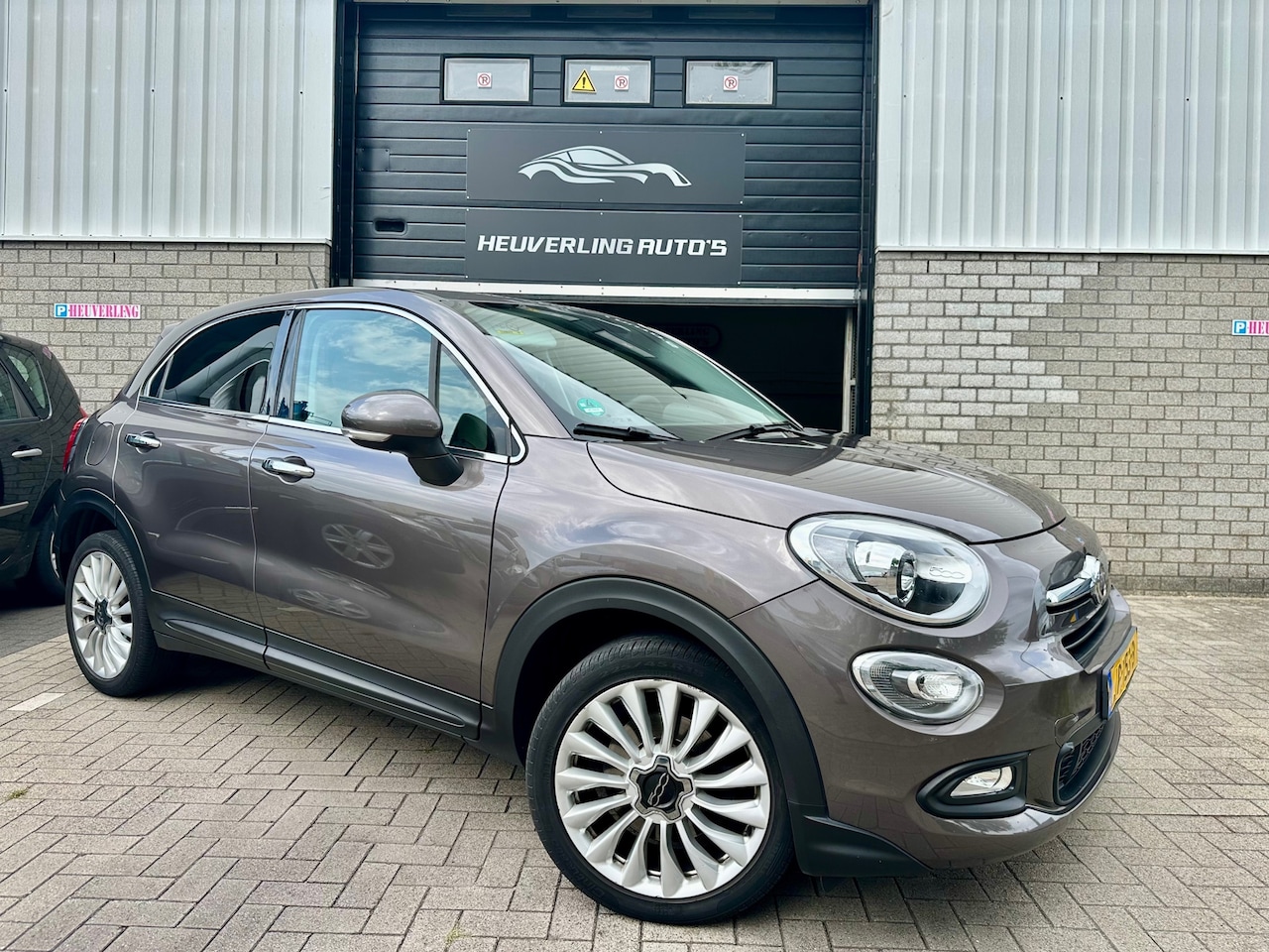 Fiat 500 X - 1.4 Turbo MultiAir Lounge | Cruise | Clima | PDC | Navi - AutoWereld.nl