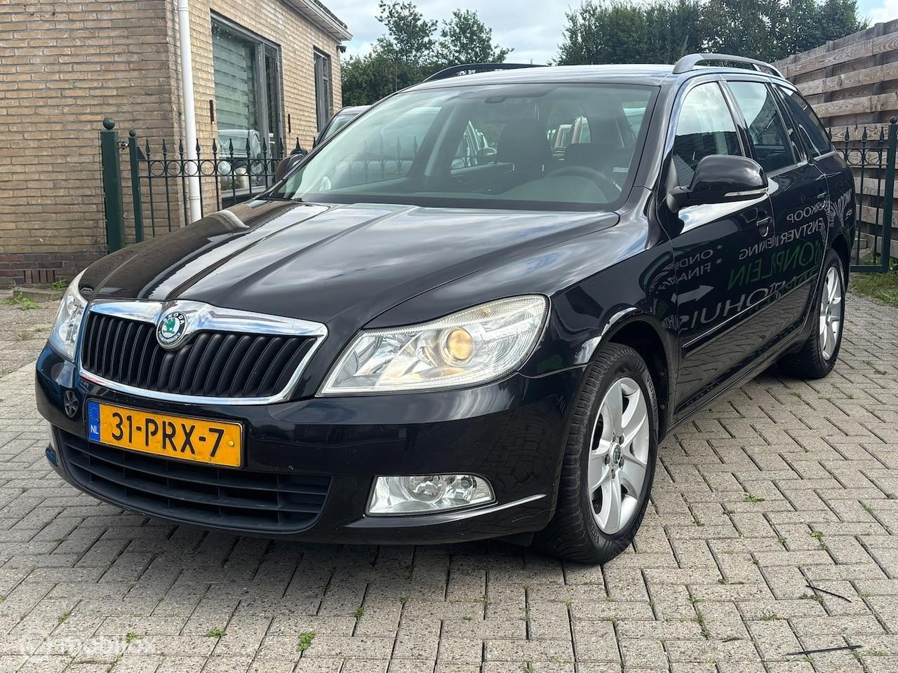 Skoda Octavia Combi - 1.2 TSI Ambition Business Line | airco | navi | cruise | trekhaak | lange apk - AutoWereld.nl