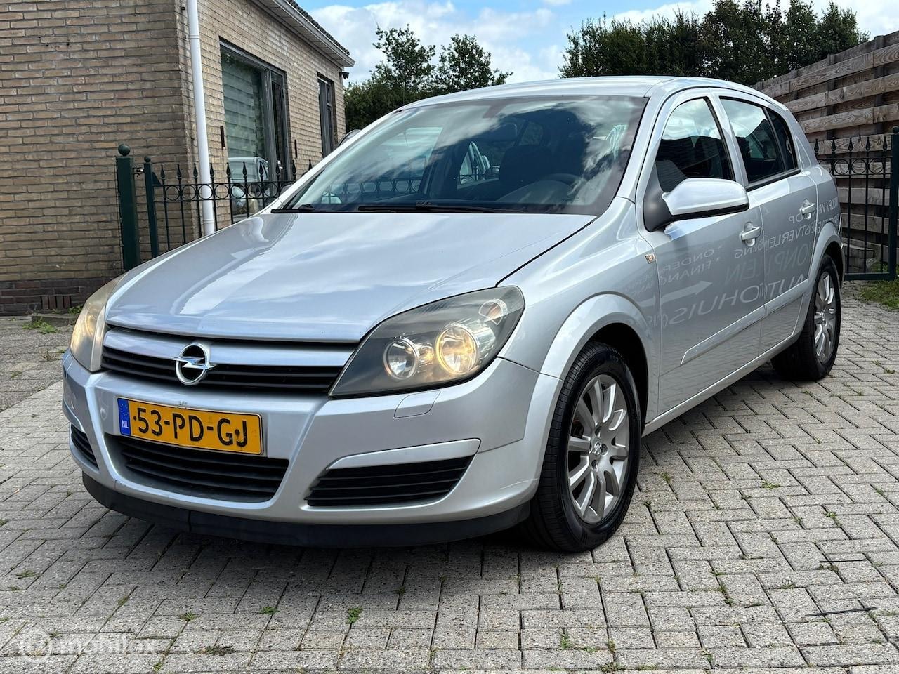 Opel Astra - 1.4 Enjoy | airco | cruise | 5drs | nieuwe apk | rijd perfect - AutoWereld.nl