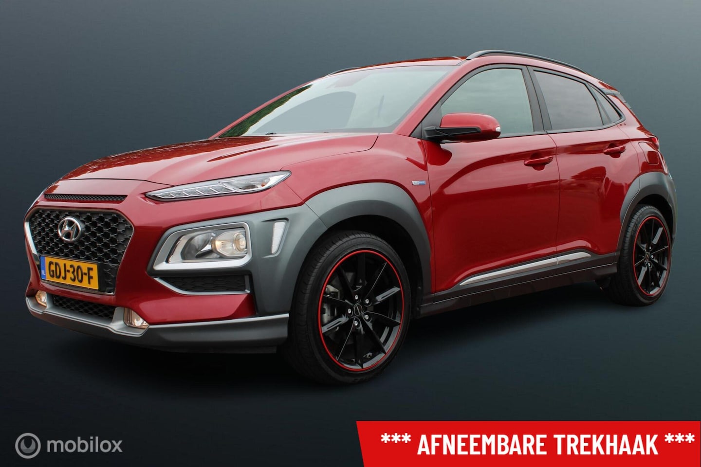Hyundai Kona - 1.6 GDI HEV Fashion Sport, Rosso Color Package, Trekhaak, Donker glas + zwarte hemel, Navi - AutoWereld.nl