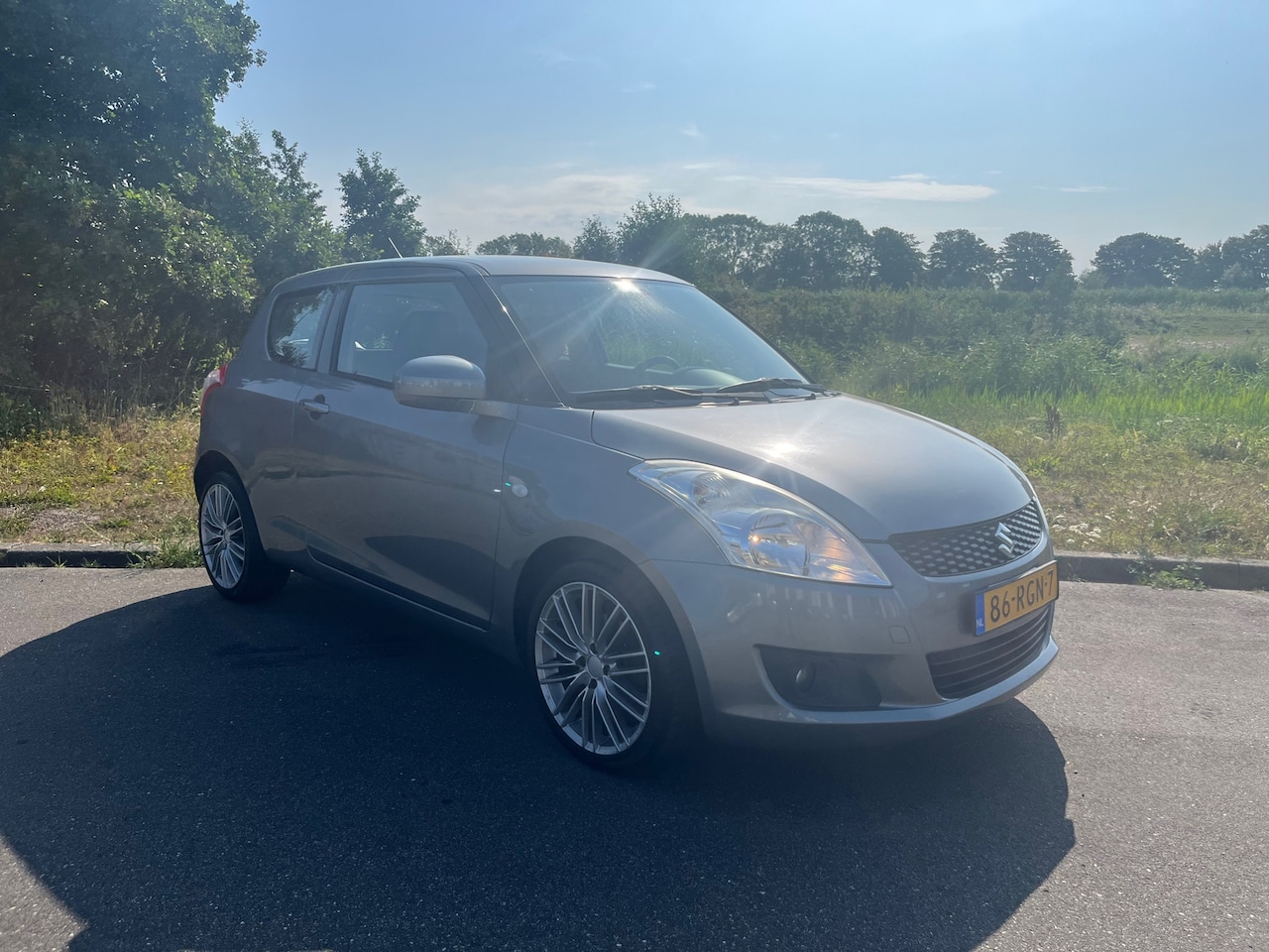 Suzuki Swift - 1.2 Exclusive BJ 2011 AIRCO ZEER GOED ONDERHOUDEN - AutoWereld.nl