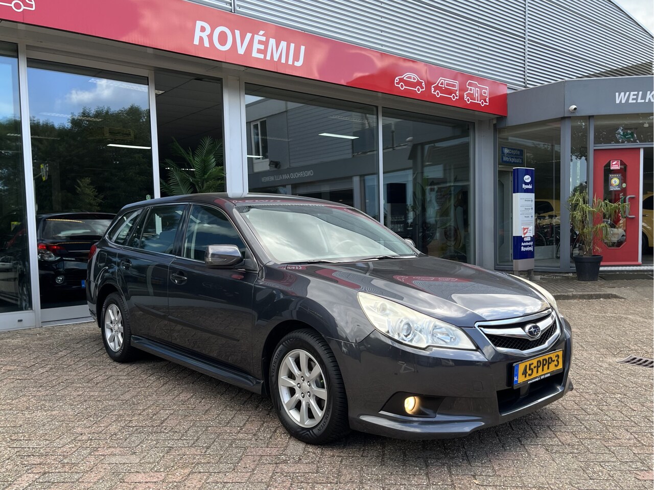 Subaru Legacy Touring Wagon - 2.0i Intro Automaat, Trekhaak, Cruise - AutoWereld.nl