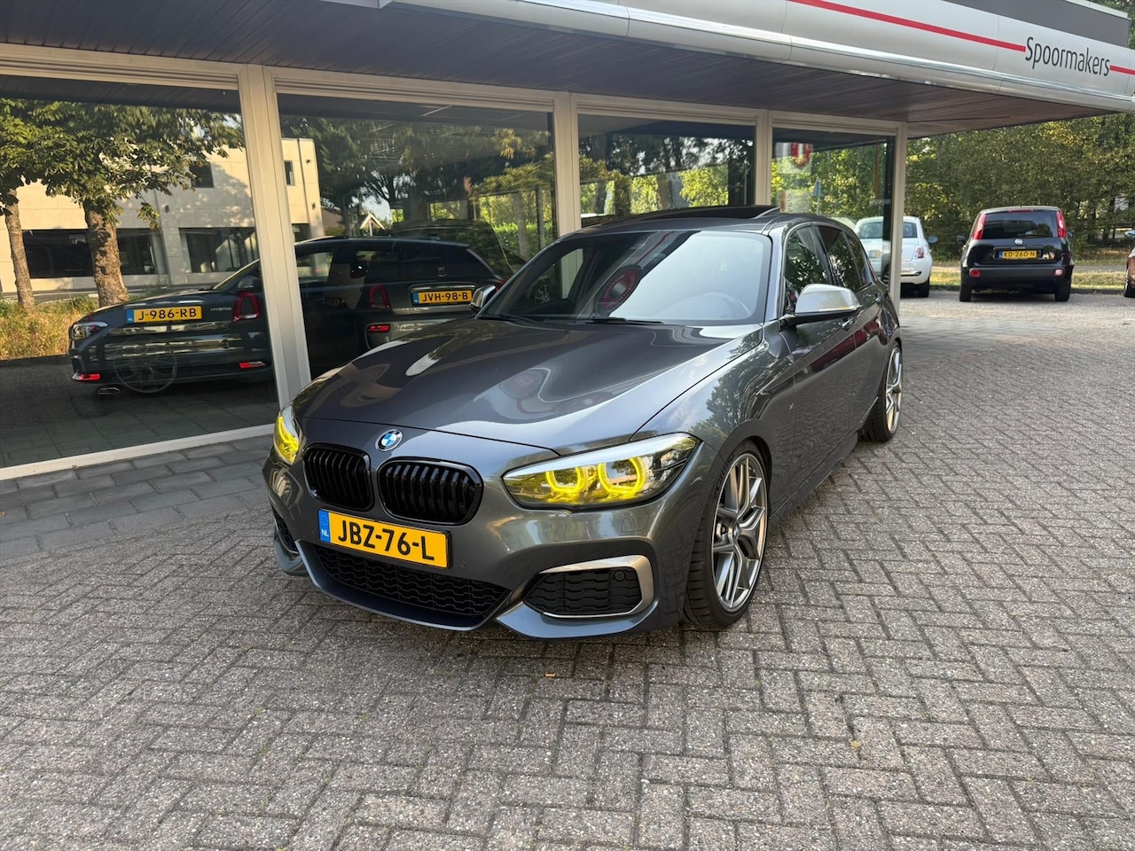 BMW 1-serie - (f20) M140i 340pk xDrive Aut M High Executive Milltek - AutoWereld.nl