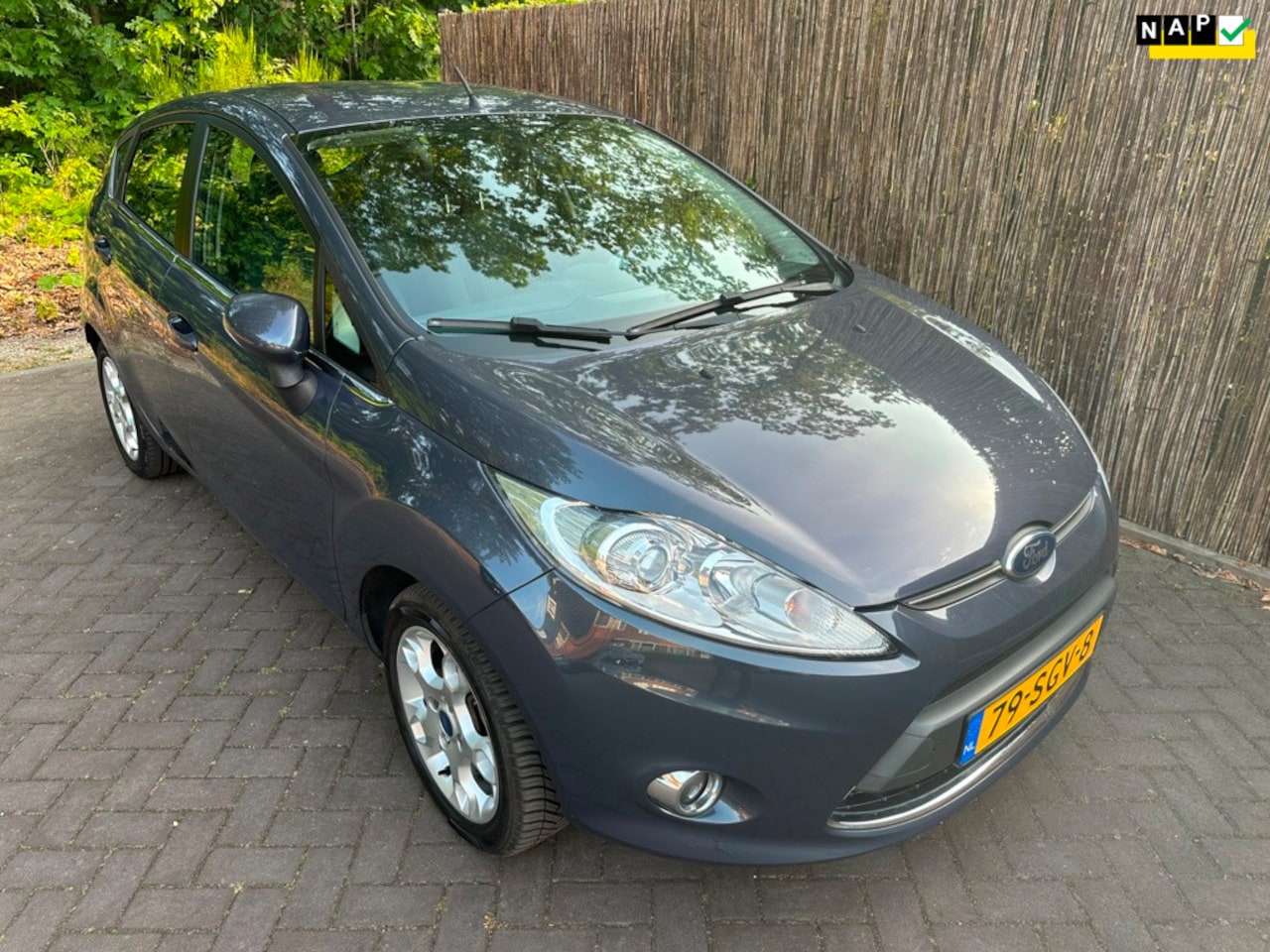 Ford Fiesta - 1.25 Titanium 5-Drs AIRCO/CRUISE/PDC/1STE EIGENAAR - AutoWereld.nl