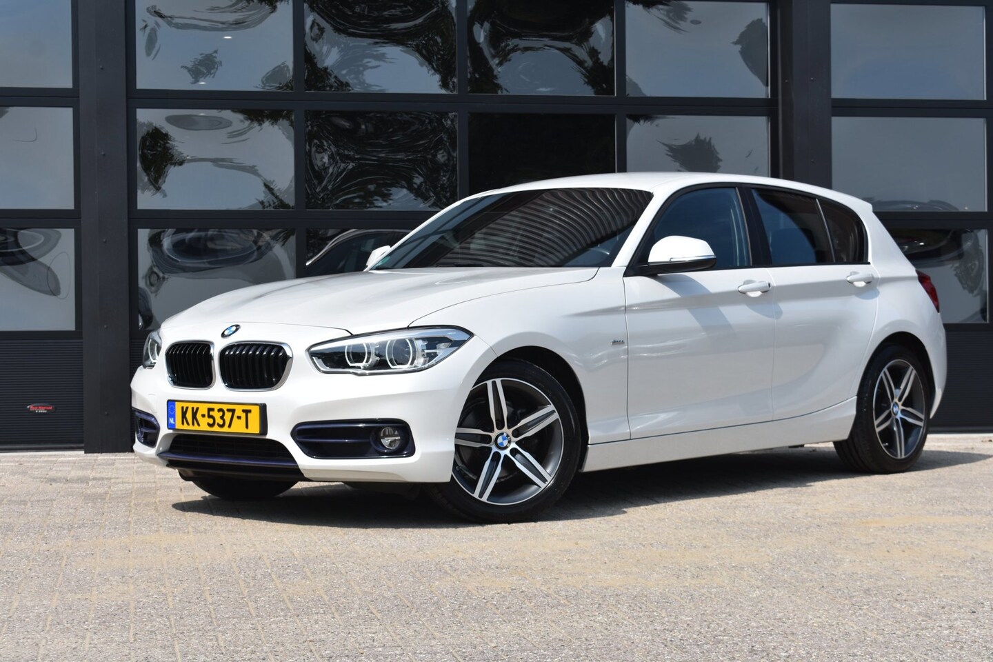 BMW 1-serie - 118i Centennial High Executive '16 LED Leder Clima Navi Cruise Inruil mogelijk - AutoWereld.nl
