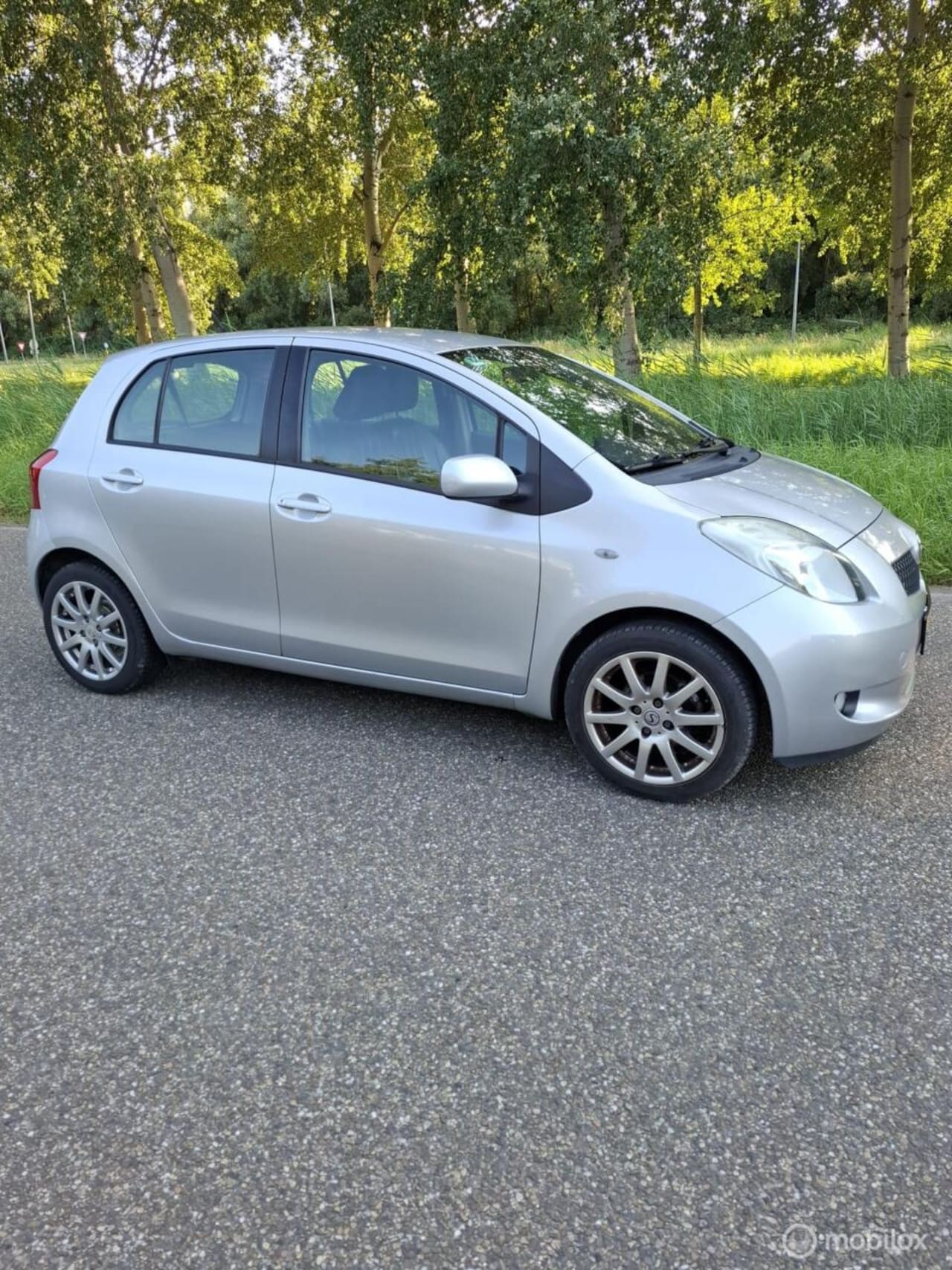 Toyota Yaris - 1.3 VVTi Sol MMT Leder bekleding - AutoWereld.nl