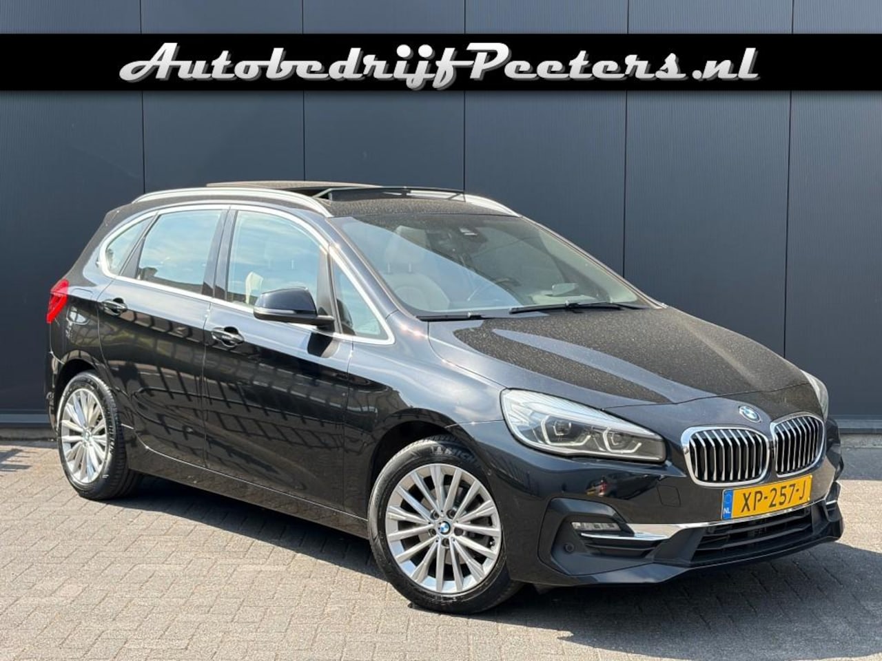 BMW 2-serie Active Tourer - 218i Aut. Pano LED Leder Camera Navi Cruise HUD Trekhaak NL-auto - AutoWereld.nl