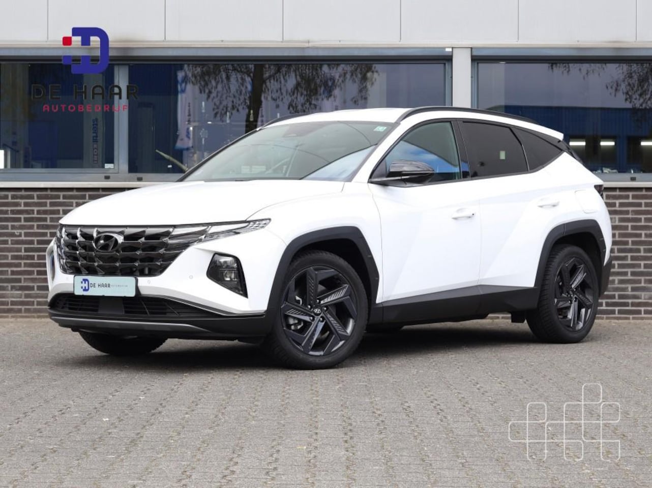Hyundai Tucson - 1.6 T-GDI Advantage - Sensoren - LED - Camera - Navi - Trekhaak - AutoWereld.nl