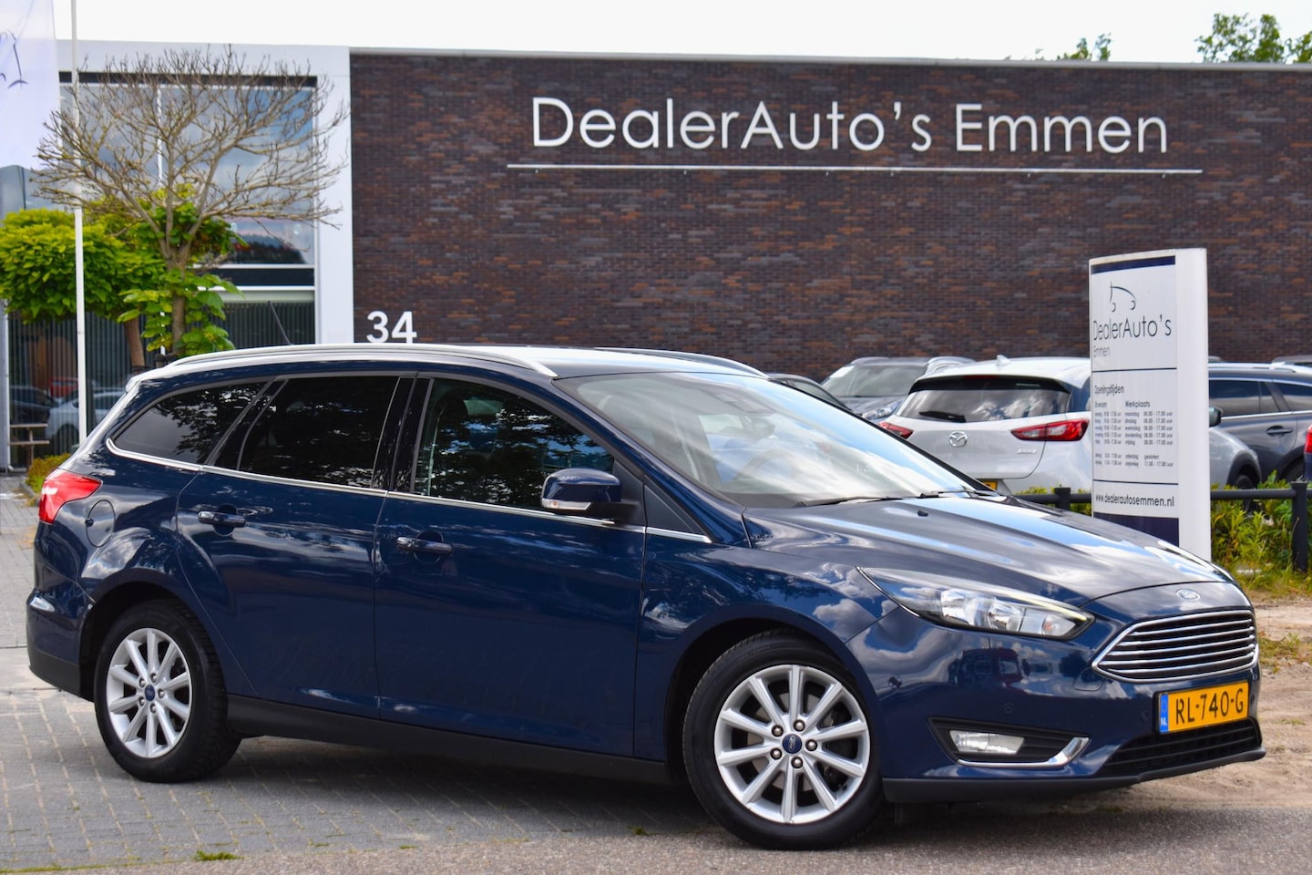Ford Focus Wagon - 1.5 TDCI ECC LMV NAVI TREKHAAK - AutoWereld.nl