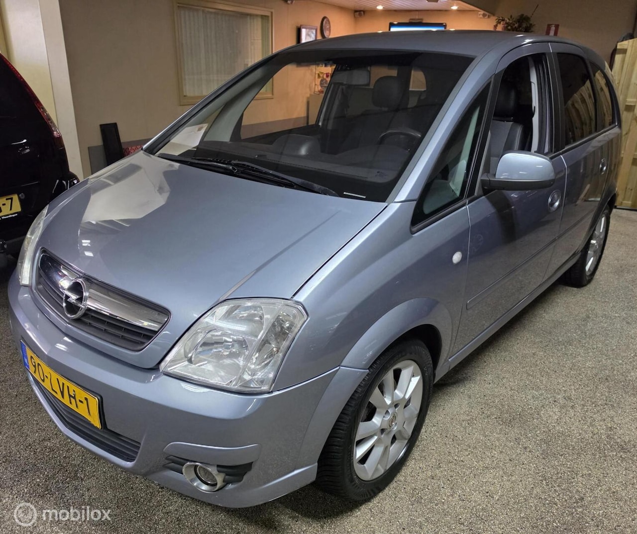Opel Meriva - 1.6-16V Cosmo Airco, Leder, Navi. - AutoWereld.nl