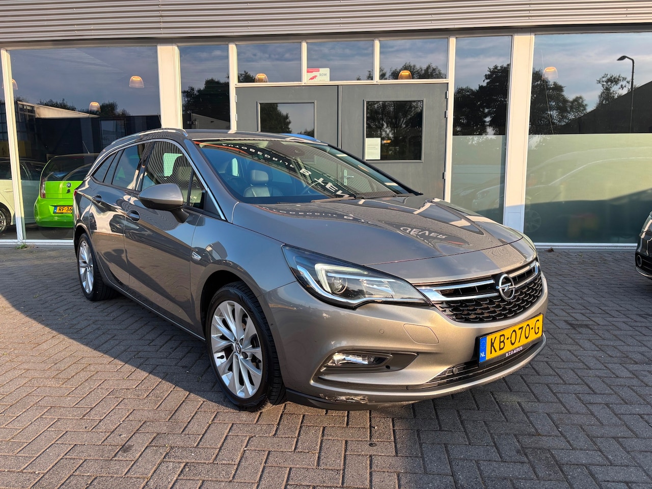 Opel Astra Sports Tourer - 1.0 Innovation / Airco / stoelverwarming voor en achter / stuurverwarming / multifunctione - AutoWereld.nl