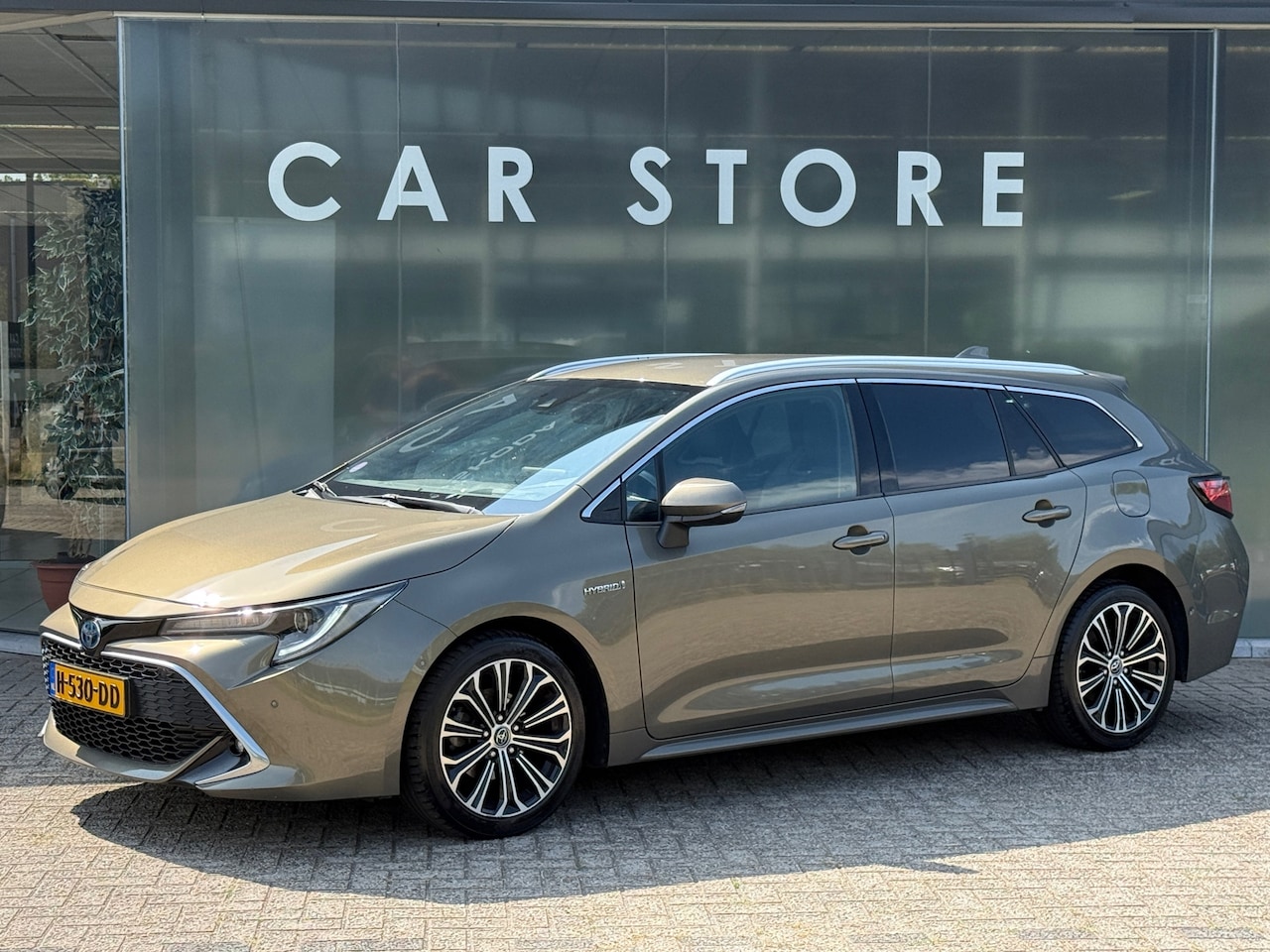 Toyota Corolla Touring Sports - 1.8 Hybrid Executive Dealer Onderhouden - AutoWereld.nl