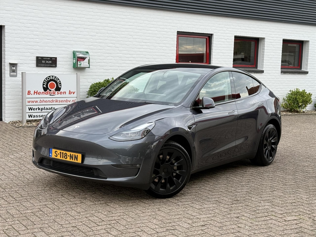 Tesla Model Y - Long Range AWD/ SOH 94.3%/ 20 Inch velgen/ Warmtepomp/ Premium sound/ 1 Eigenaar/ Originee - AutoWereld.nl