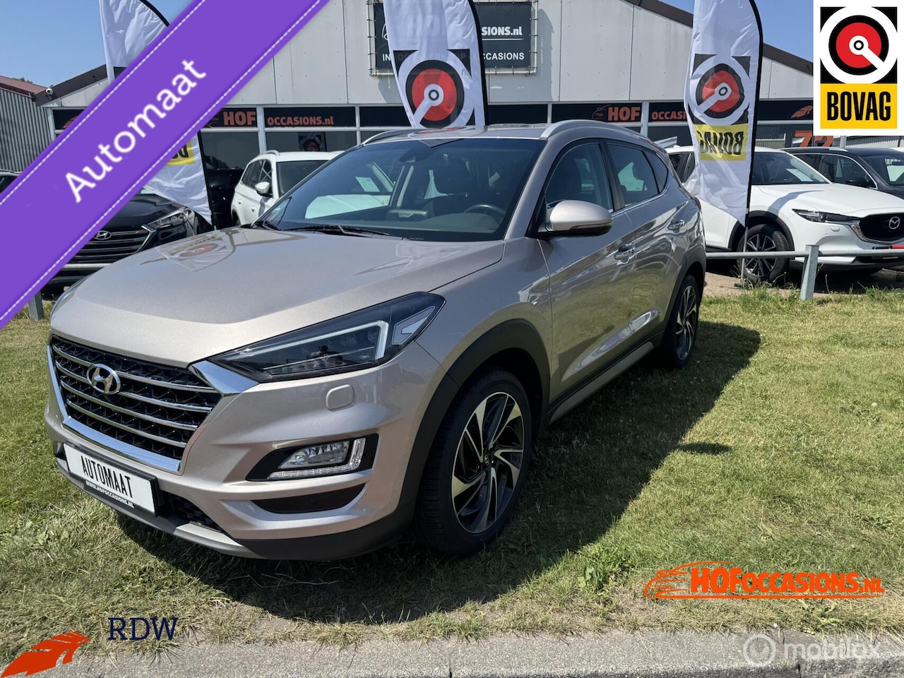 Hyundai Tucson - 1.6 T-GDI 4WD Premium AUTOMAAT/CARPLAY/TREKHAAK - AutoWereld.nl